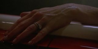 Julie Benz's hand on Dexter
