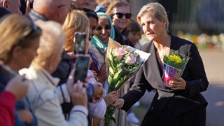 Sophie, Duchess of Edinburgh meets well wishers and views floral tributes outside Windsor Castle following the death of Queen Elizabeth II