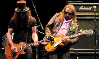 Slash (left) and Ace Frehley perform at the 6th Annual MusiCares MAP Fund Benefit Concert at Club Nokia on May 7, 2010 in Los Angeles, California