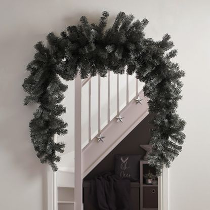 How to create a DIY Christmas door arch decoration | Ideal Home