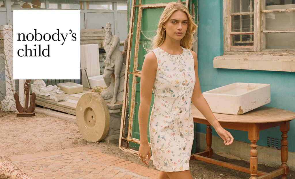 Nobodys child logo top left with a blonde woman in white midi dress