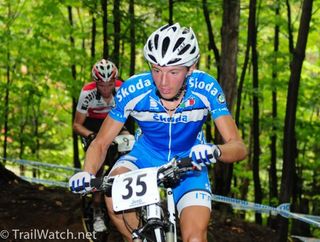 Tony Longo (Italy) rides an uphill wooded section of the course