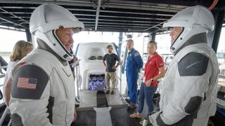 NASA astronauts, from left, Doug Hurley and Bob Behnken will fly aboard the Crew Dragon to the International Space Station in the upcoming Demo-2 mission. During the Aug. 13, 2019 rehearsal.