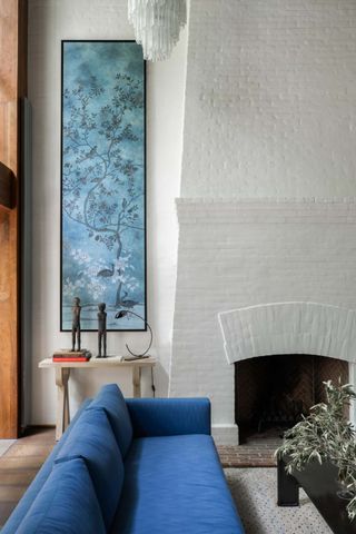 A living room with wall art