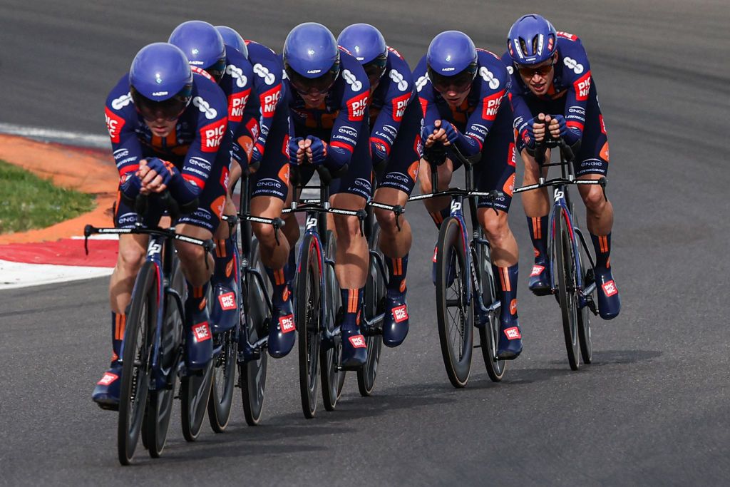 Team Picnic PostNL's riders cycle during the 3rd stage of the Paris-Nice cycling race, a 28,4 km team time trial between Nevers Magny-Cours Circuit and Nevers, on March 11, 2025. (Photo by Anne-Christine POUJOULAT / AFP)