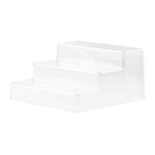 White plastic three-tier shelf riser