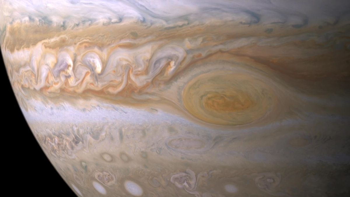 NASA - Three Red Spots Mix it Up on Jupiter