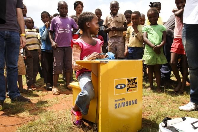 One of the items Qhubeka helps to provide are portable desks for children