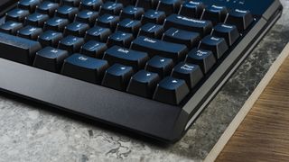 The bottom right corner of a Kinesis Freestyle Pro keyboard