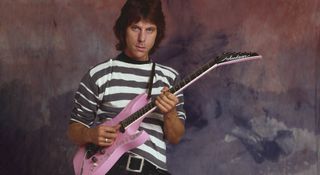 Jeff Beck wears a hooped T-shirt and plays his pink Jackson Soloist, so-called "Tina" after Tina Turner signed it.