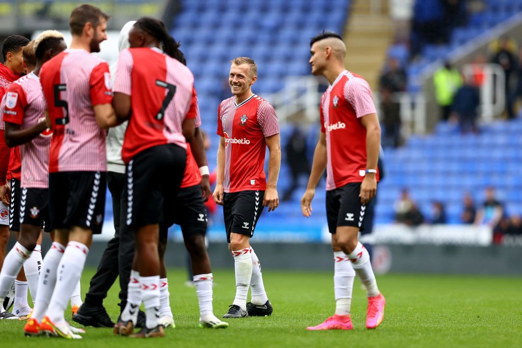 James Ward-Prowse of Southampton and Carlos Alcaraz(R) during the pre season friendly fixture between Reading FC and Southampton FC at the Select Car Leasing Stadium on July 22, 2023 in Reading, England. 