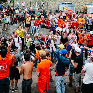 Sep Vanmarcke soaks up the fantastic energy of thousands of orange-clad fans as he rides through Dutch Corner.