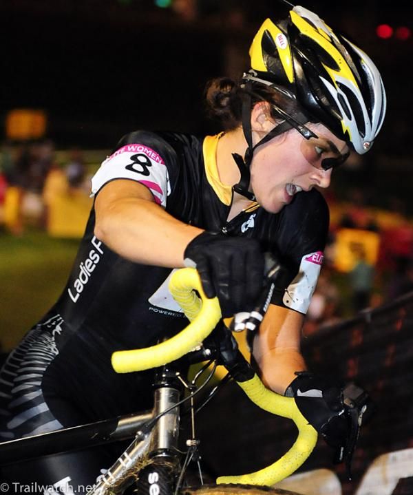 Andrea Smith (Ladies First Racing) running with her bike at Cross Vegas