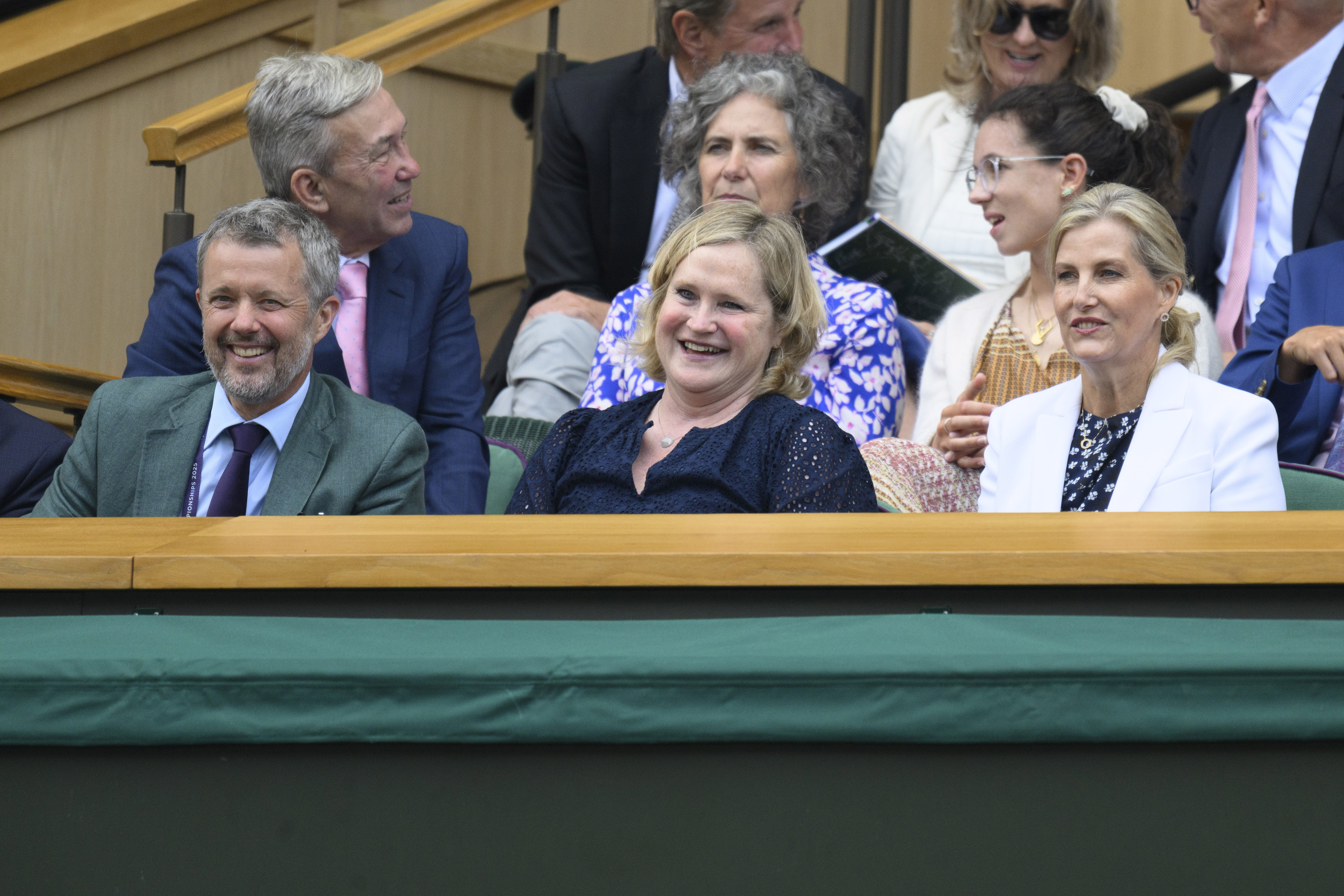 Duchess Sophie wearing a white blazer at Wimbledon next to King Frederik and Annabelle Galletley, her private secretary, at Wimbledon