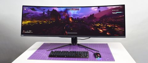 An MSI MPG 491CQP QD-OLED on a desk playing Helldivers 2