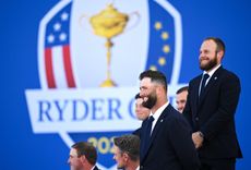 Jon Rahm and Tyrrell Hatton stand up at the 2023 Ryder Cup opening ceremony