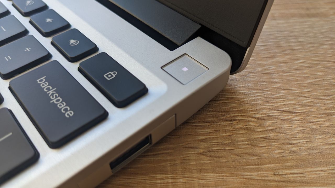 The Framework Laptop Chromebook Edition photographed on a wooden desk.