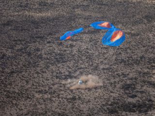 Touchdown of Blue Origin's New Shepard capsule, the RSS H.G. Wells, carrying Club for the Future postcards and other payloads on Dec. 11, 2019. The capsule reached an apogee of about 65 miles (105 kilometers) before returning to Earth.