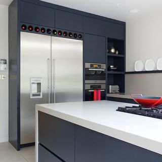 kitchen with white worktop and grey cabinet