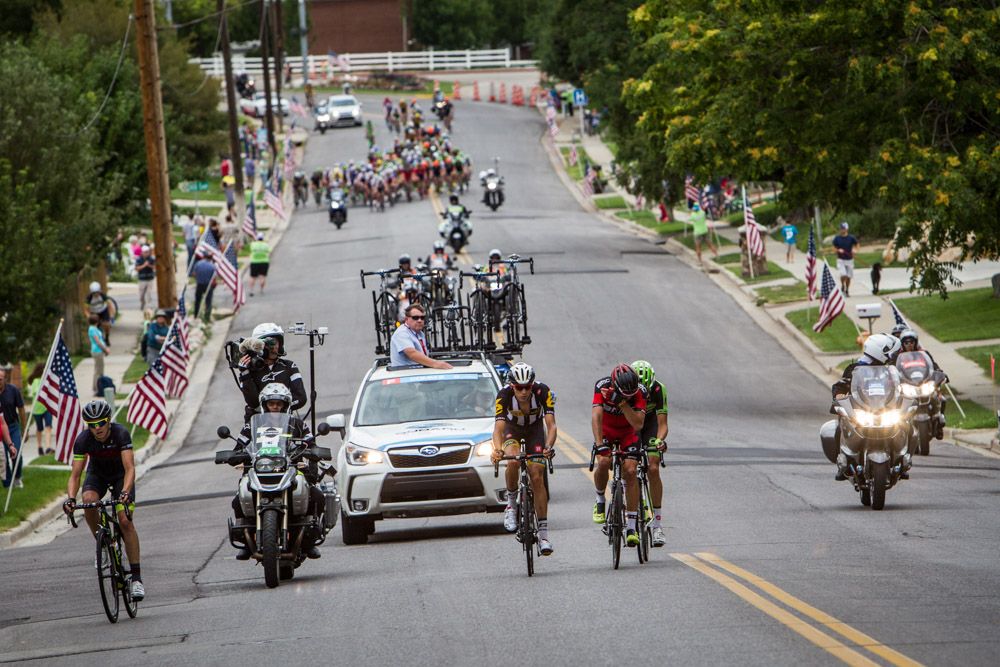 The break hits the climb with the field closing in.