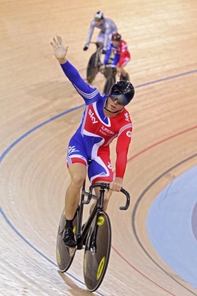 Sir Chris Hoy celebrates when GB go top of the leader board in the men&sup1;s team sprint