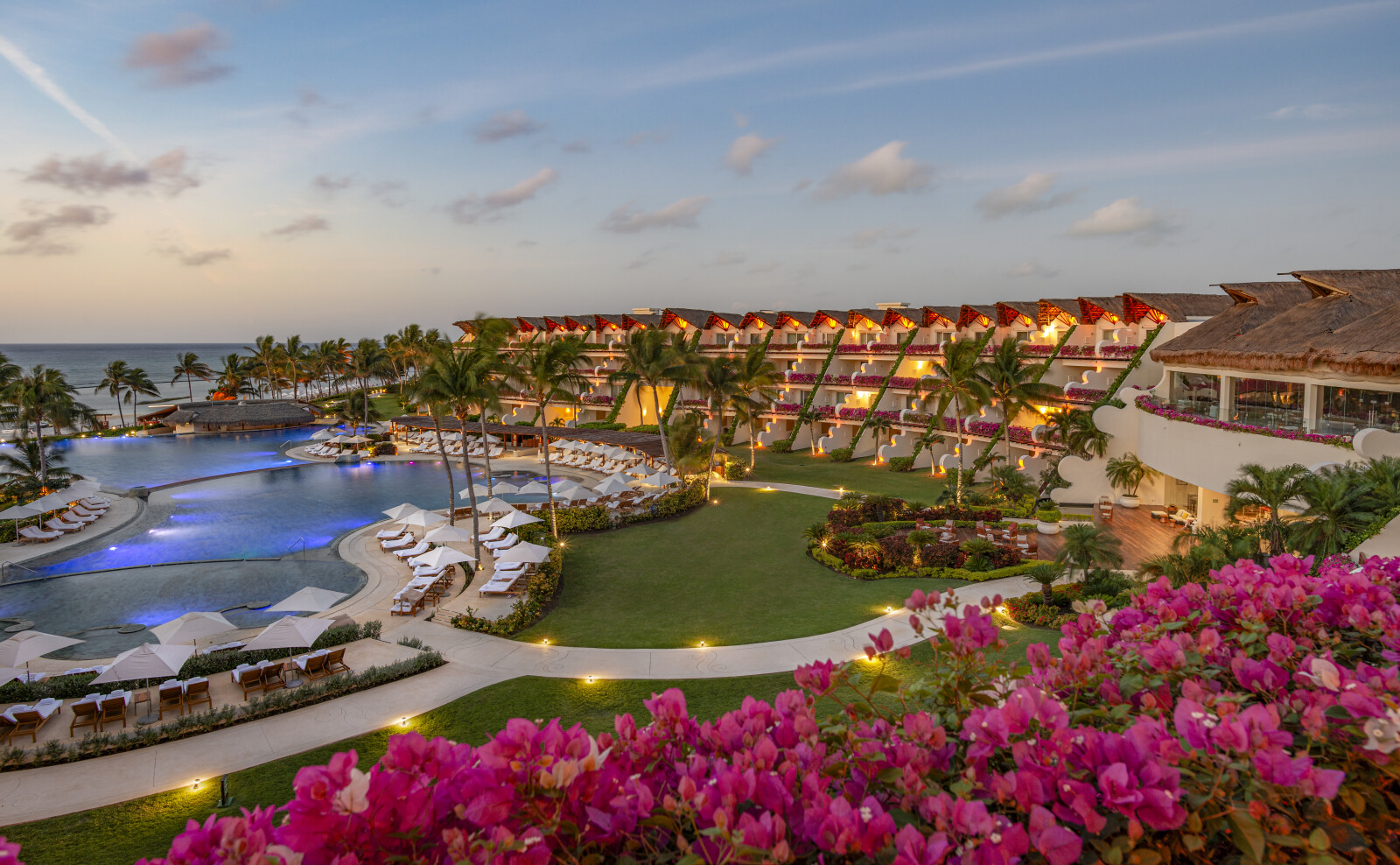 Grand Velas Riviera Maya exterior at sunset