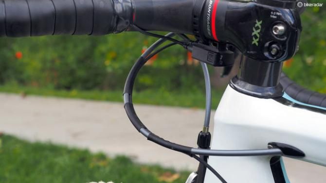 Husband/mechanic Mark Legg has a strict 'no zip ties' policy so the Shimano Di2 wiring is bundled to the rear brake housing with sections of heat shrink tubing