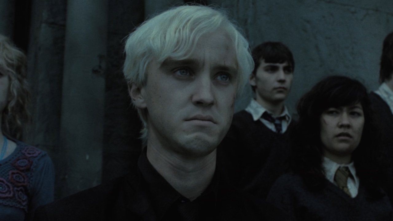Tom Felton frowning when Draco&#039;s parent ask him to join them in the Battle of Hogwarts