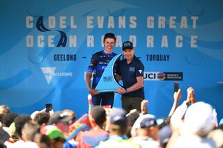 GEELONG AUSTRALIA JANUARY 28 LR Laurence Pithie of New Zealand and Team GroupamaFDJ receives the trophy as race winner from the hands of Cadel Evans of Australia Ex Procyclist during the 8th Cadel Evans Great Ocean Road Race 2024 Mens Elite a 1743km one day race from Geelong to Geelong UCIWT on January 28 2024 in Geelong Australia Photo by Tim de WaeleGetty Images