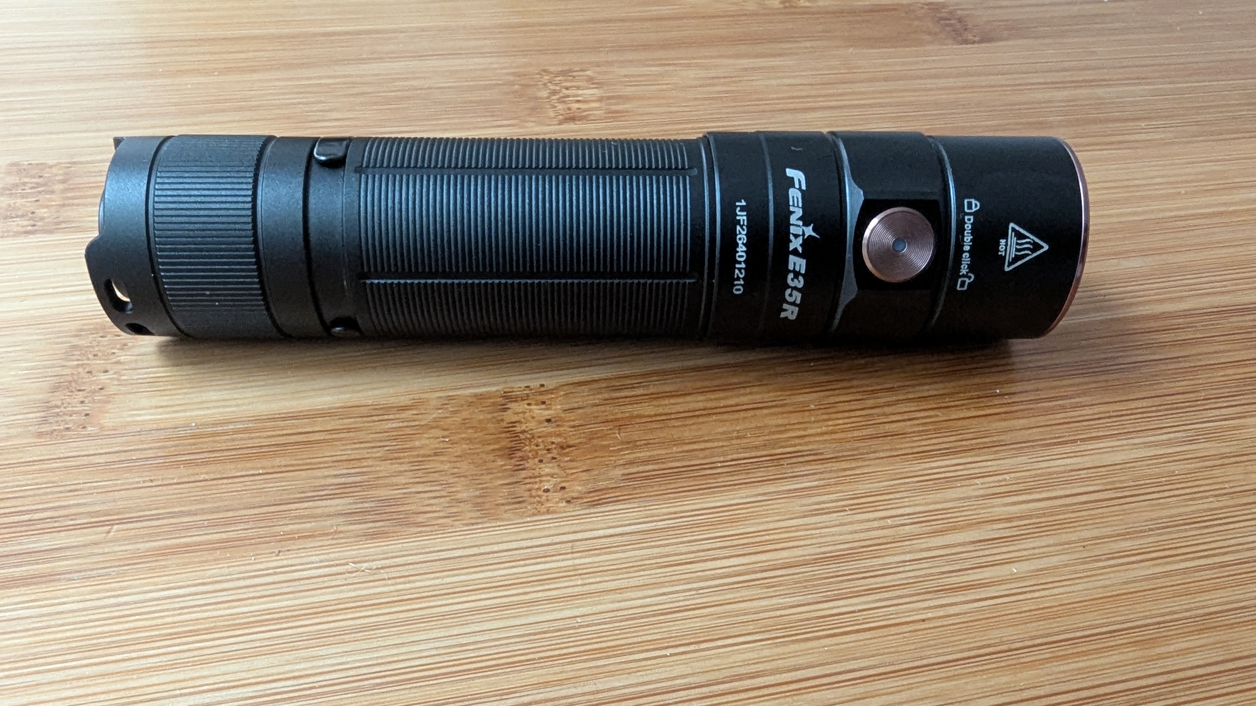 Fenix E35R flashlight during review