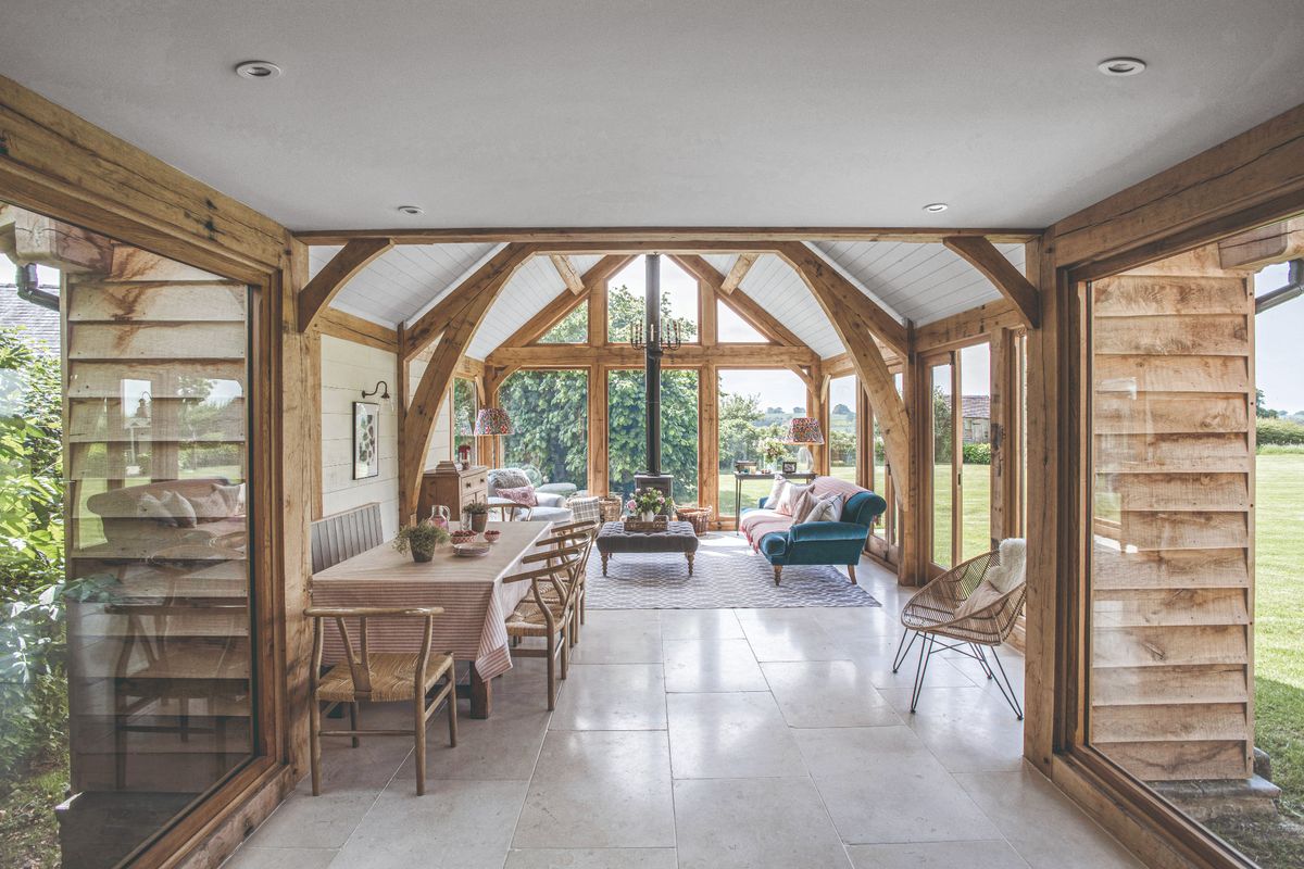 A bright and spacious timber frame living room with expansive glazing