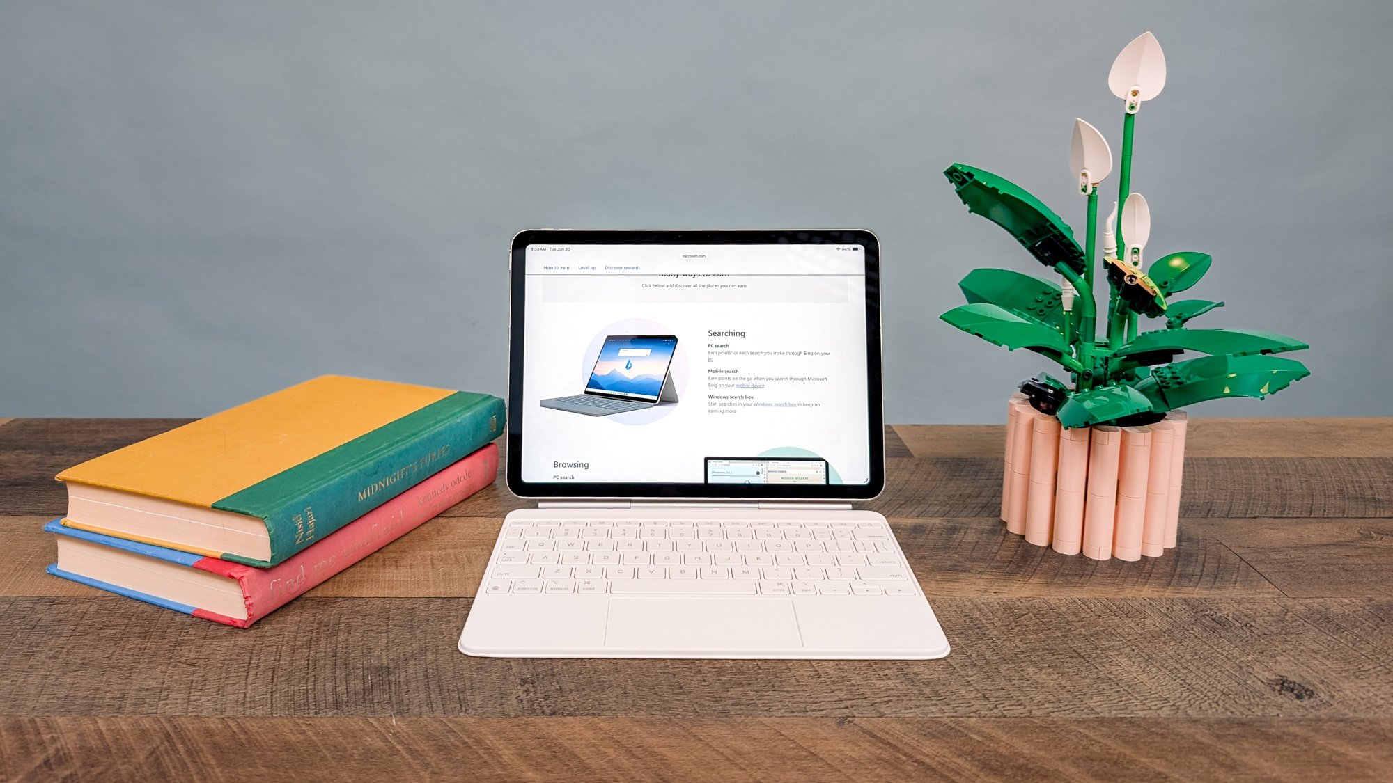 A tablet on a table showing how the Microsoft Rewards program works