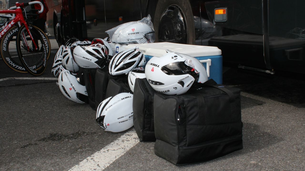 Road helmets, aero road helmets and brand new TT lids still in the bag all wait at the ready for Trek Factory riders.