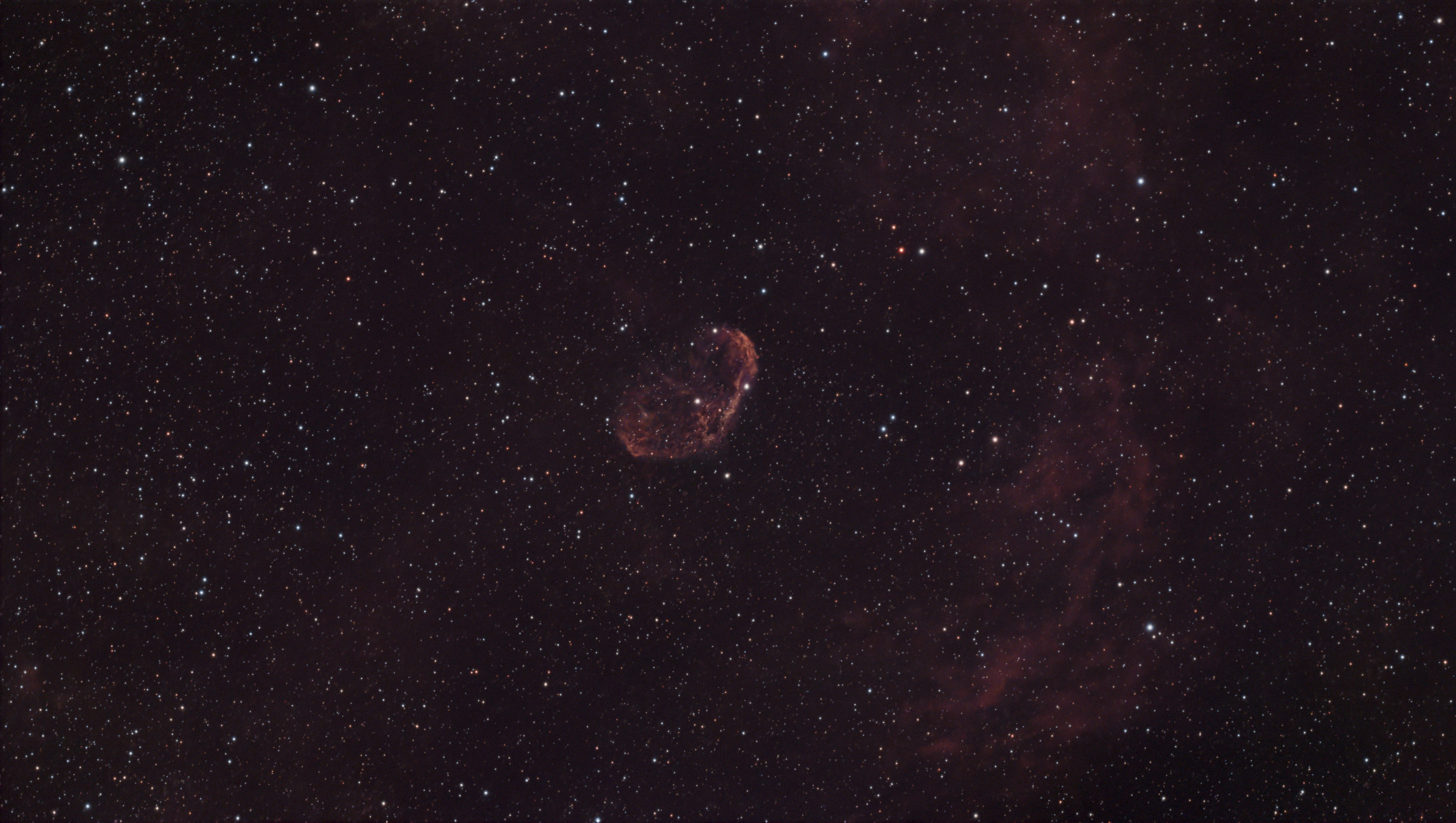 A photograph of the Crescent Nebula, taken with the Dwarf III smart telescope, processed in Pixinsight