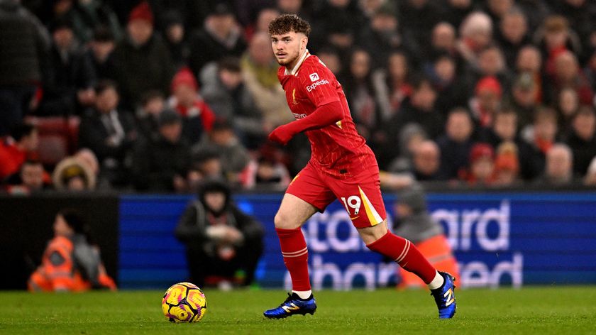 Harvey Elliott of Liverpool FC runs with the ball during a match