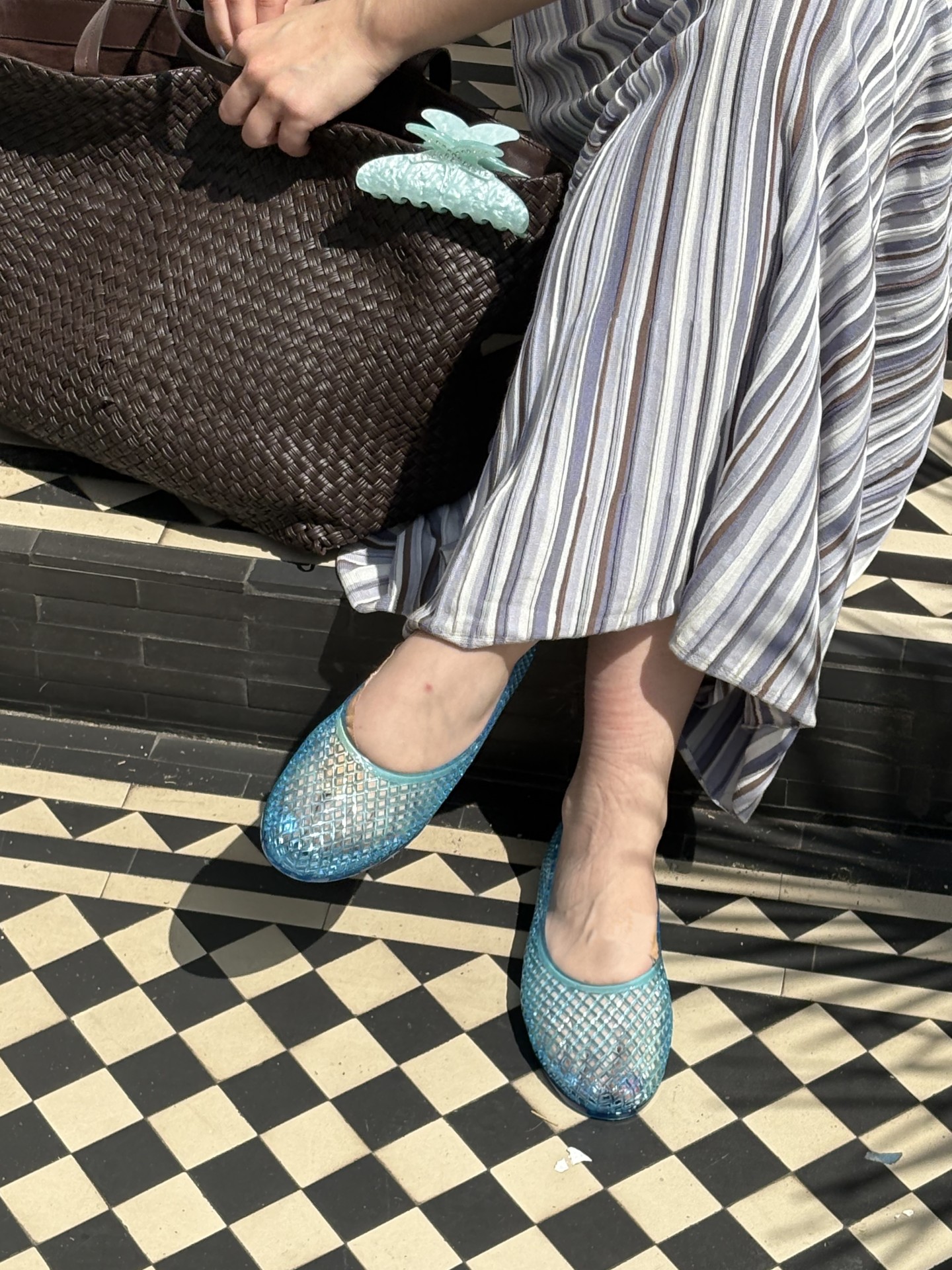 An image ofBest Knockoff Luxury Clothing
 UK's Ava Gilchrist wearing jelly sandals.