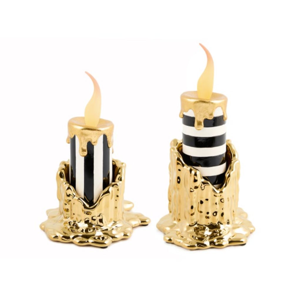Black and white striped battery candles with gold holders