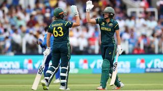 Ashleigh Gardner of Australia celebrates her fifty runs with Ellyse Perry during the ICC Women's T20 World Cup match between Australia and India