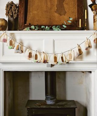 Decorated mantel with homemade advent calendar