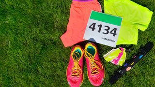Running shoes, marathon race bib (number), runners gear