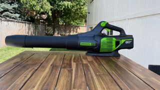 greenworks 80v leaf blower on a table in the yard