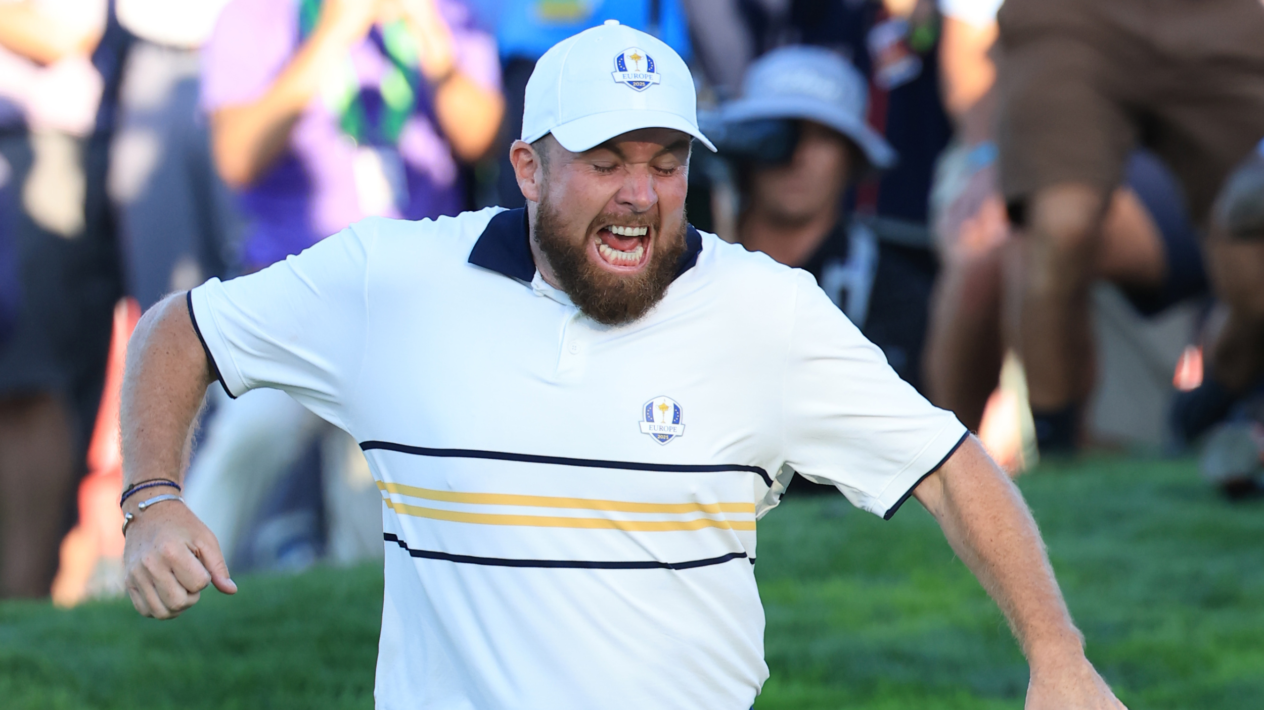 Shane Lowry celebrates holing the putt that won the Ryder Cup for Team Europe 