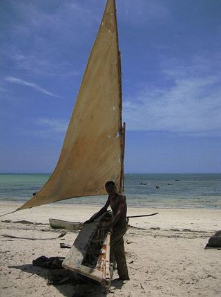 A fisherman is pictured on Kenyatta Beach. In her research, Emily Darling interviewed fishermen and counted the catch they were landing. Darling and her colleagues hope to strengthen coral reef fisheries management by coordinating a program that looks at the ecological status, fisheries productivity and the well-being of rural economies and fishers.