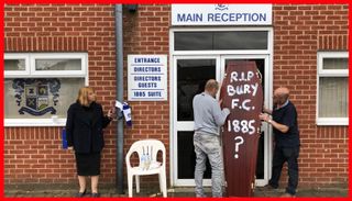 Former director Joy Hart, who has handcuffed herself to the main stand at ailing Bury FC, pleads for help to save the club as fans deliver a symbolic coffin to the front door