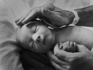 Simon Cowell shares baby pics of his son Eric via Twitter..