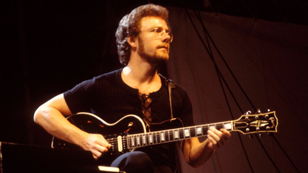 Robert Fripp performing live on stage, playing Gibson Les Paul guitar, Schaefer Music Festival, Central Park, New York, 25th June 1973