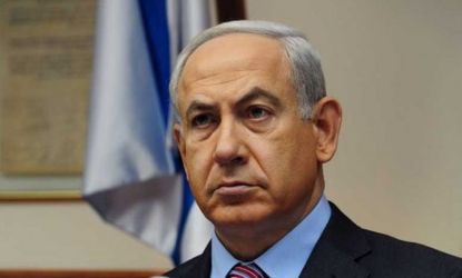 Israeli Prime Minister Benjamin Netanyahu attends the weekly cabinet meeting in his Jerusalem office on Nov. 18: Netanyahu warned of an escalation in Israel's Gaza offensive.