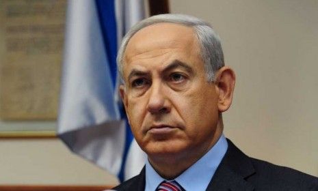 Israeli Prime Minister Benjamin Netanyahu attends the weekly cabinet meeting in his Jerusalem office on Nov. 18: Netanyahu warned of an escalation in Israel&amp;#039;s Gaza offensive.