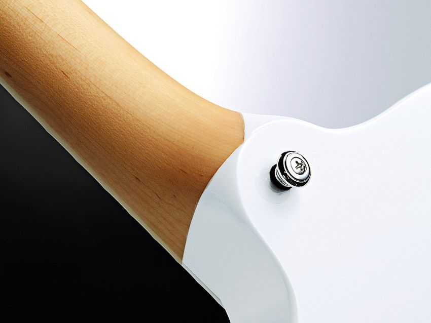 A three-piece strip of maple makes up the neck, headstock and body core.