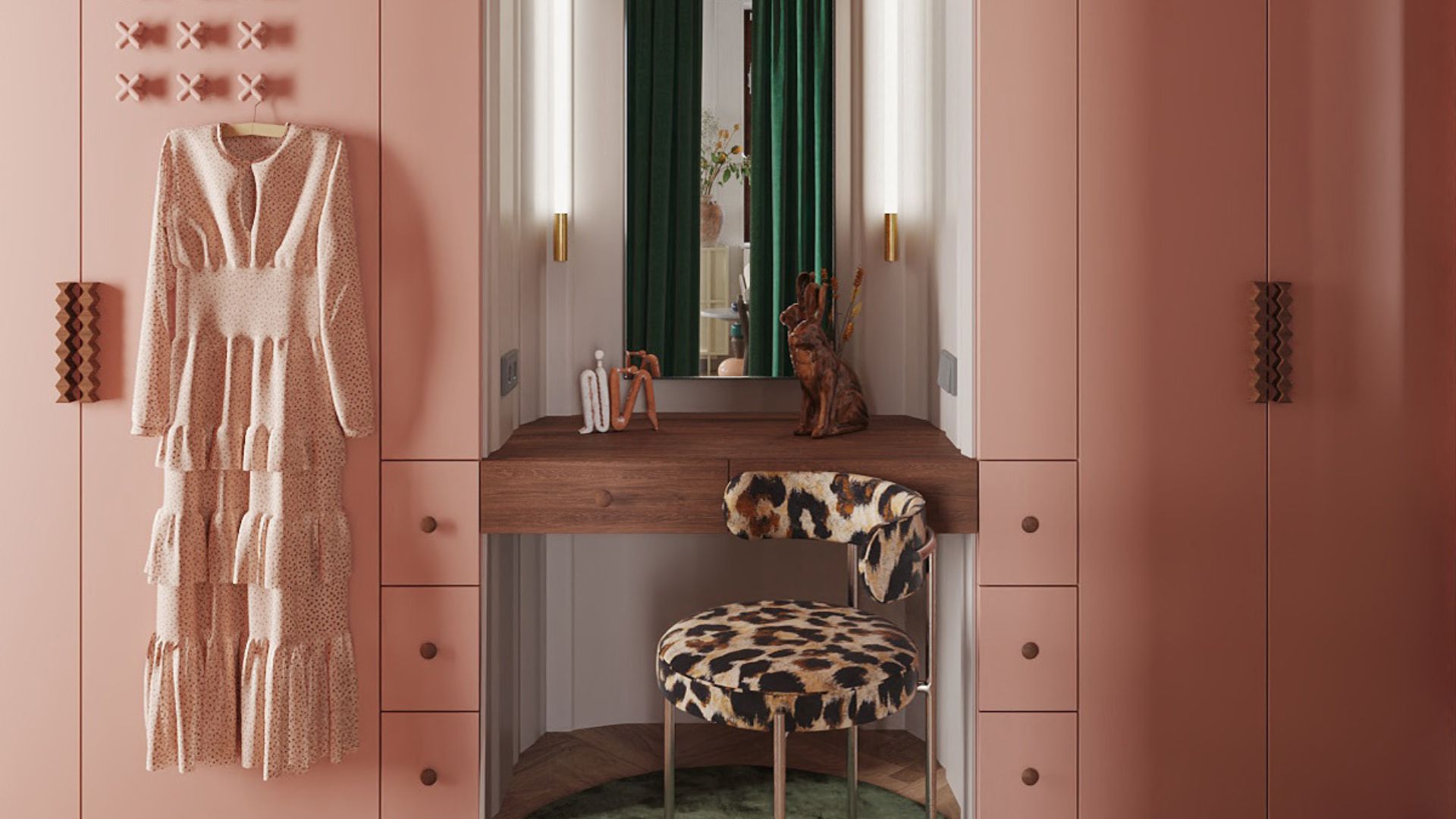A blush walk-in wardrobe with gemoetric wood handles, a patterned dress on a hanger hanging on a cross-shaped knob, and a wood vanity with a mirror, and a cheetah print stool on a round green rug